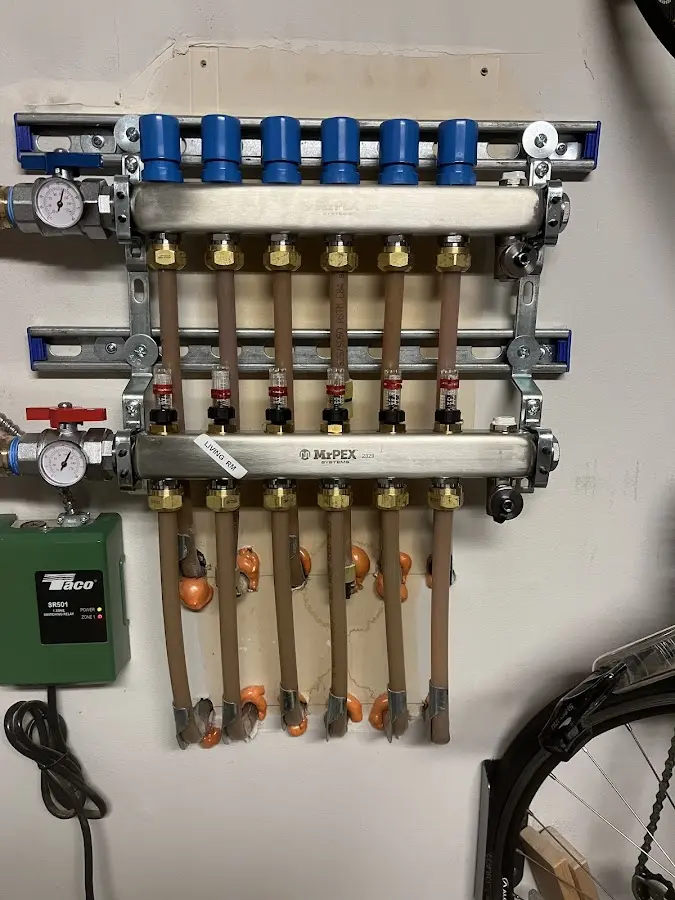 Plumber performing Water Heater Repair at a residential property in Breese